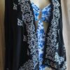 Marque : Babacool Taille : 2 Matière : Viscose (supposée) Couleur : Noir et blanc Broderies contrastantes Finition dentelle Coupe fluide Très bon état Prix : 9 € Une pièce légère et intemporelle, idéale pour compléter un look estival avec élégance.