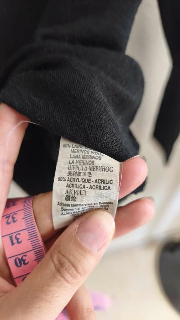 Pull vintage noir et blanc esprit Courrèges en laine mérinos – taille 36
