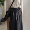 Jupe midi vintage en cuir noir – Taille 34/36