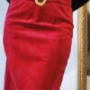 Jupe vintage rouge en cuir véritable femme taille 42, coupe droite et ceinture assortie à boucle dorée.